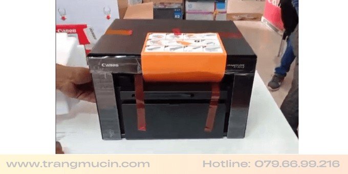 Các bước gỡ băng dính bảo vệ trên máy in Canon 3010