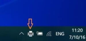 Biểu tượng máy in trên thanh Taskbar để truy cập hàng đợi lệnh in cần xóa