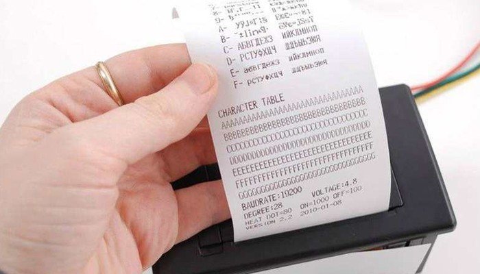 Hình ảnh minh họa máy in bị lỗi font chữ do driver chưa được cập nhật hoặc cài đặt sai.