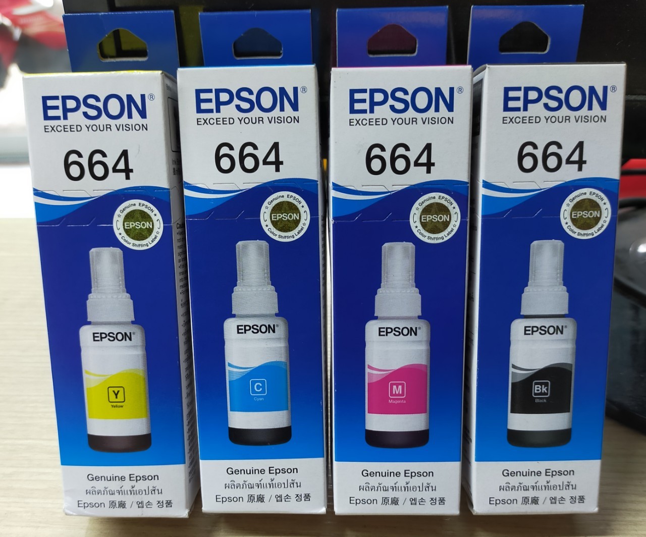 Bộ 4 chai mực in Epson T664 chính hãng màu đen, xanh, đỏ, vàng