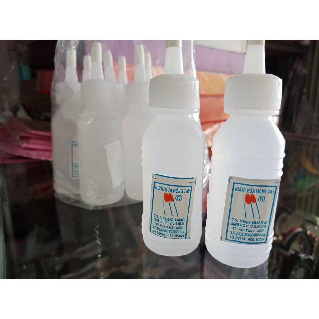 Tẩy mực máy in trên giấy bằng dung dịch tẩy sơn móng tay chứa axeton