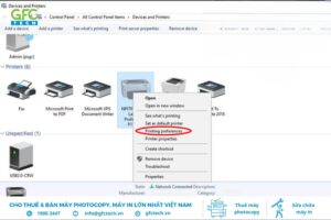 Chọn máy in Epson cần clear mực và truy cập Printing Preferences để vào cài đặt bảo trì