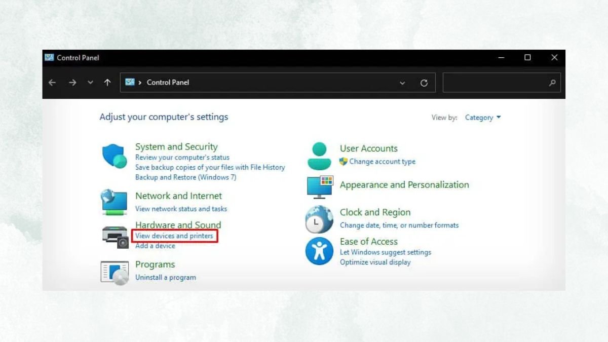 Đặt tài liệu úp xuống trên mặt kính quét của máy in HP