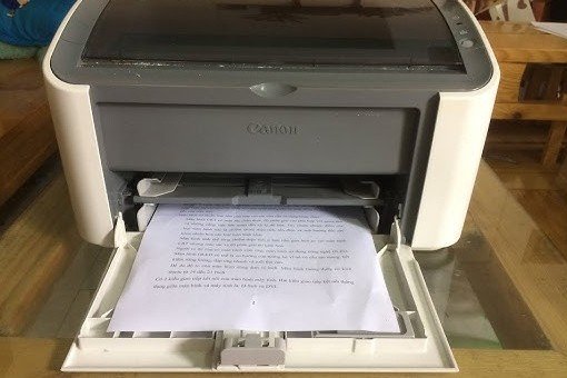 In thử bản test để kiểm tra chất lượng sau khi hoàn tất cách thay mực máy in Canon