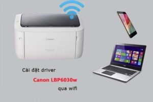 Chuẩn bị cài đặt máy in Canon 6030W WiFi với máy tính, cáp USB và máy in đã bật nguồn