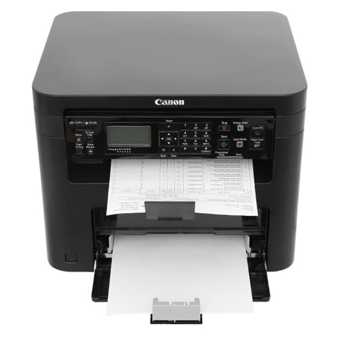 Máy in đa năng Canon MF221D nhìn từ phía trước, đặt trên bàn làm việc