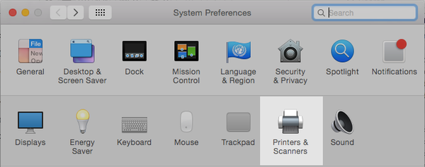 Mở System Preferences và chọn Printers & Scanners trên macOS