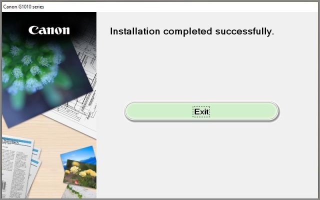 Màn hình kết thúc quá trình cài đặt driver máy in Canon G1010 yêu cầu khởi động lại máy tính
