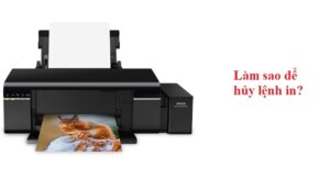 Máy in Epson đang thực hiện lệnh in và người dùng tìm cách hủy lệnh in trên máy tính Win 10