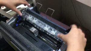 Hình ảnh hộp mực Brother TN2060 và máy in Brother HL 2130
