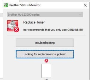 Máy in Brother HL L2321D hiển thị thông báo Replace Toner cần thay hộp mực mới