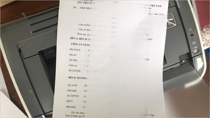 Bản in có vệt trắng dọc báo hiệu máy in sắp hết mực