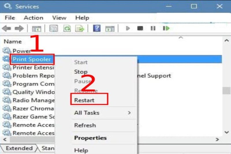 Chọn Restart để khởi động lại dịch vụ Print Spooler