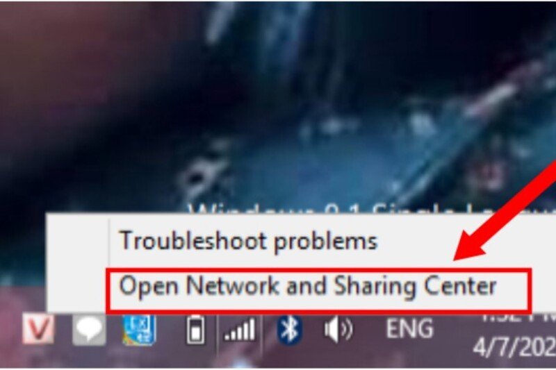 Mở Open Network and Sharing Center để cấu hình mạng cho máy in