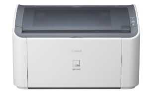 Máy in laser Canon LBP 2900 màu trắng nhỏ gọn đặt trên bàn làm việc