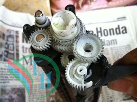 Hình ảnh minh họa bánh răng reset trên hộp mực máy in Brother HL-1211W