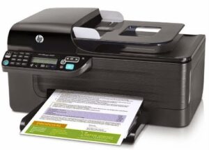 Kỹ thuật viên đang kiểm tra sửa chữa máy in HP LaserJet 1150 tại Hà Nội