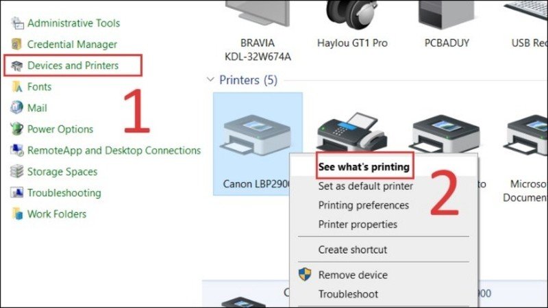 Truy cập mục Devices and Printers và chọn See what's printing để xem hàng đợi lệnh in