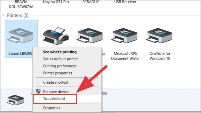 Nhấp chuột phải vào máy in và chọn Troubleshoot để Windows tự động tìm và sửa lỗi