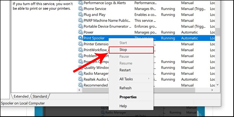 Cửa sổ Services hiển thị tùy chọn Stop dịch vụ Print Spooler để dừng lệnh in HP