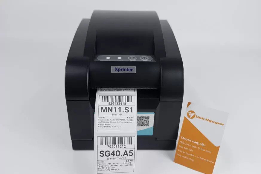 Máy in tem nhãn Xprinter XP-350BM với cuộn decal nhiệt
