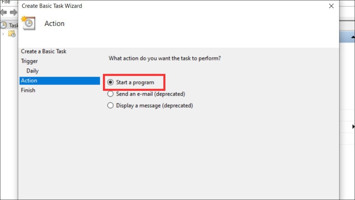 Thiết lập Action là Start a program.