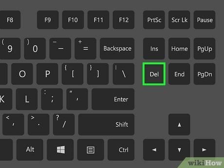 Nhấn liên tục phím BIOS khi khởi động