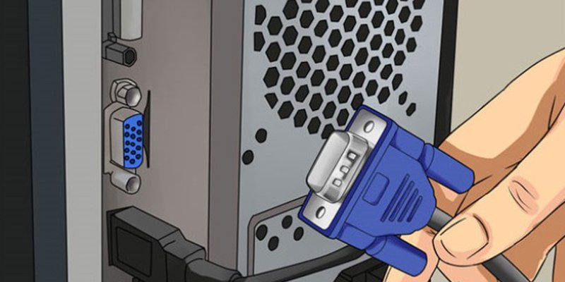 Cắm dây VGA vào thùng PC để kết nối màn hình máy tính với laptop