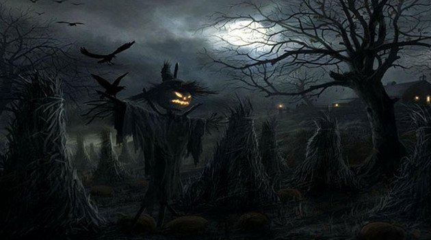 Ảnh nền Halloween cho máy tính với bù nhìn khuôn mặt bí ngô phát sáng
