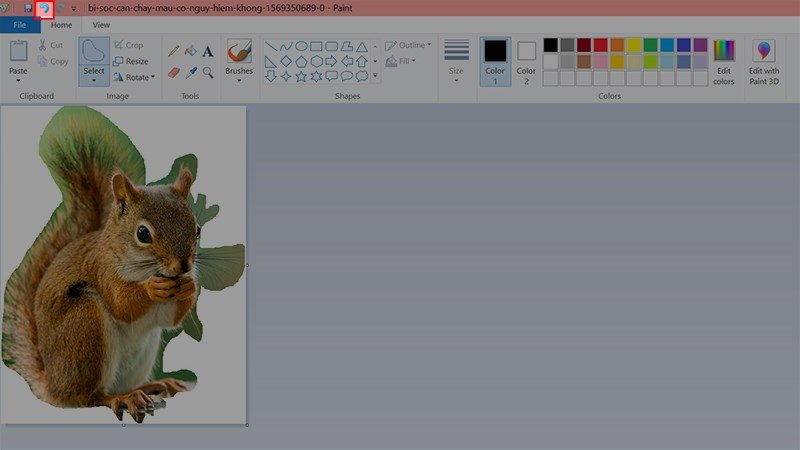 Biểu tượng mũi tên hoàn tác (Undo) trong Paint để quay lại thao tác trước.